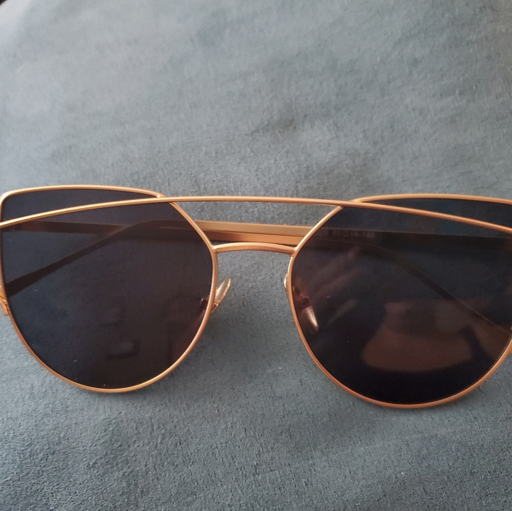 Black with gold frames.